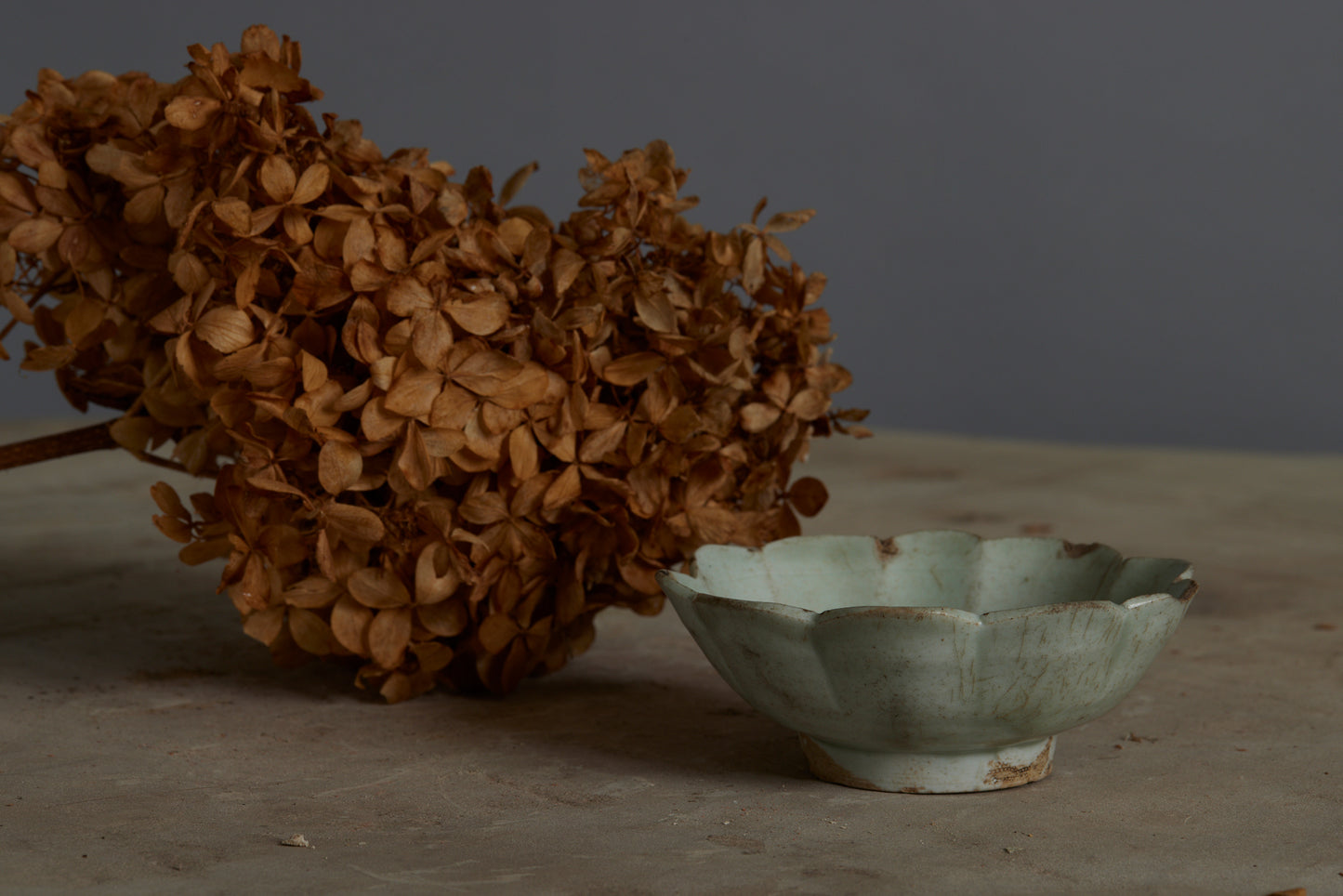 Yue Yuan Dynasty Small White Lotus Shaped Bowl with a Pale Celadon Glaze