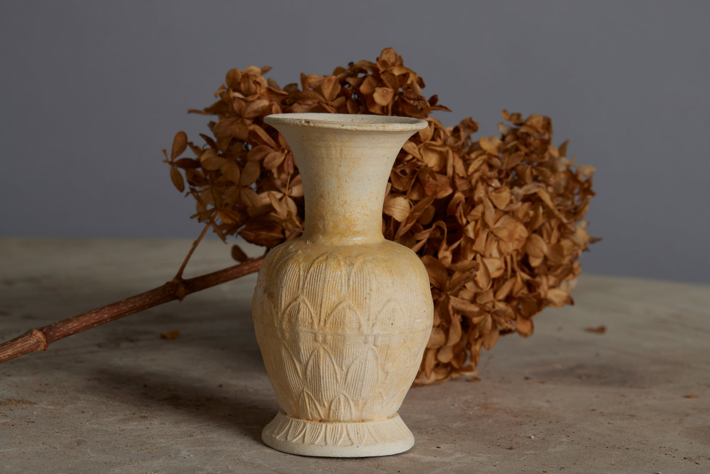 A Small White Sung Dynasty Lotus Decorated Altar Vase