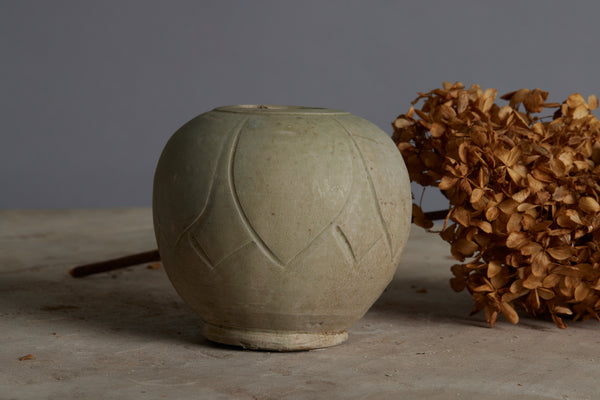 Small Sung Dynasty Pale Celadon Glazed Lotus Bud Vase Discovered in the Musi River Basin in Sumatra with a Small Chip in the Rim