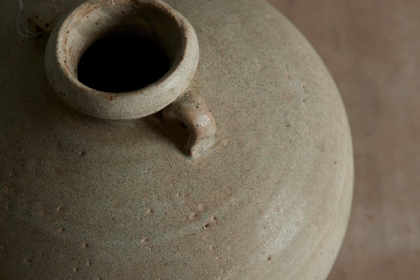 Double Handle White Glazed Sung Dynasty Coconut Shaped Bottle found in Musi River Basin in Sumatra