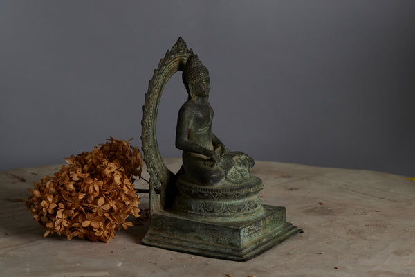 Early 15th-16th Century Bronze Buddha within a Large Halo from the Island of Java