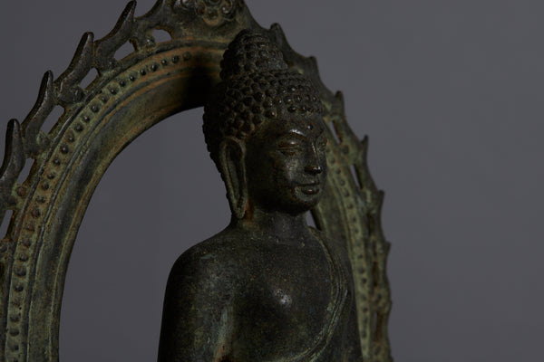 Early 15th-16th Century Bronze Buddha within a Large Halo from the Island of Java