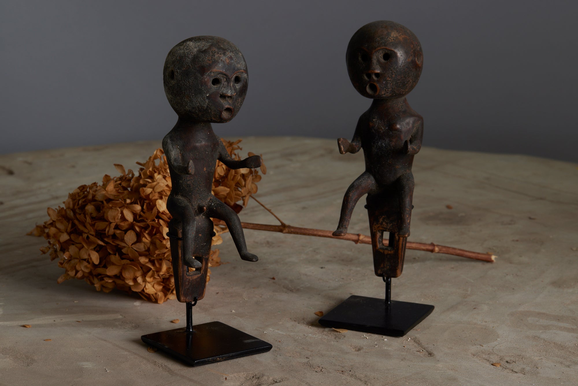 Two Carved Wooden Ceremonial Figures of a Male and a Female from the Island of Sumba