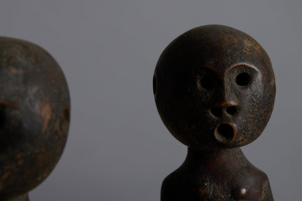 Two Carved Wooden Ceremonial Figures of a Male and a Female from the Island of Sumba