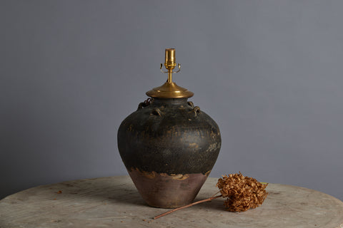 A Two Tone Chocolate Covered Sung Dynasty Storage Jar from the Musi River Basin in Sumatra as a Lamp