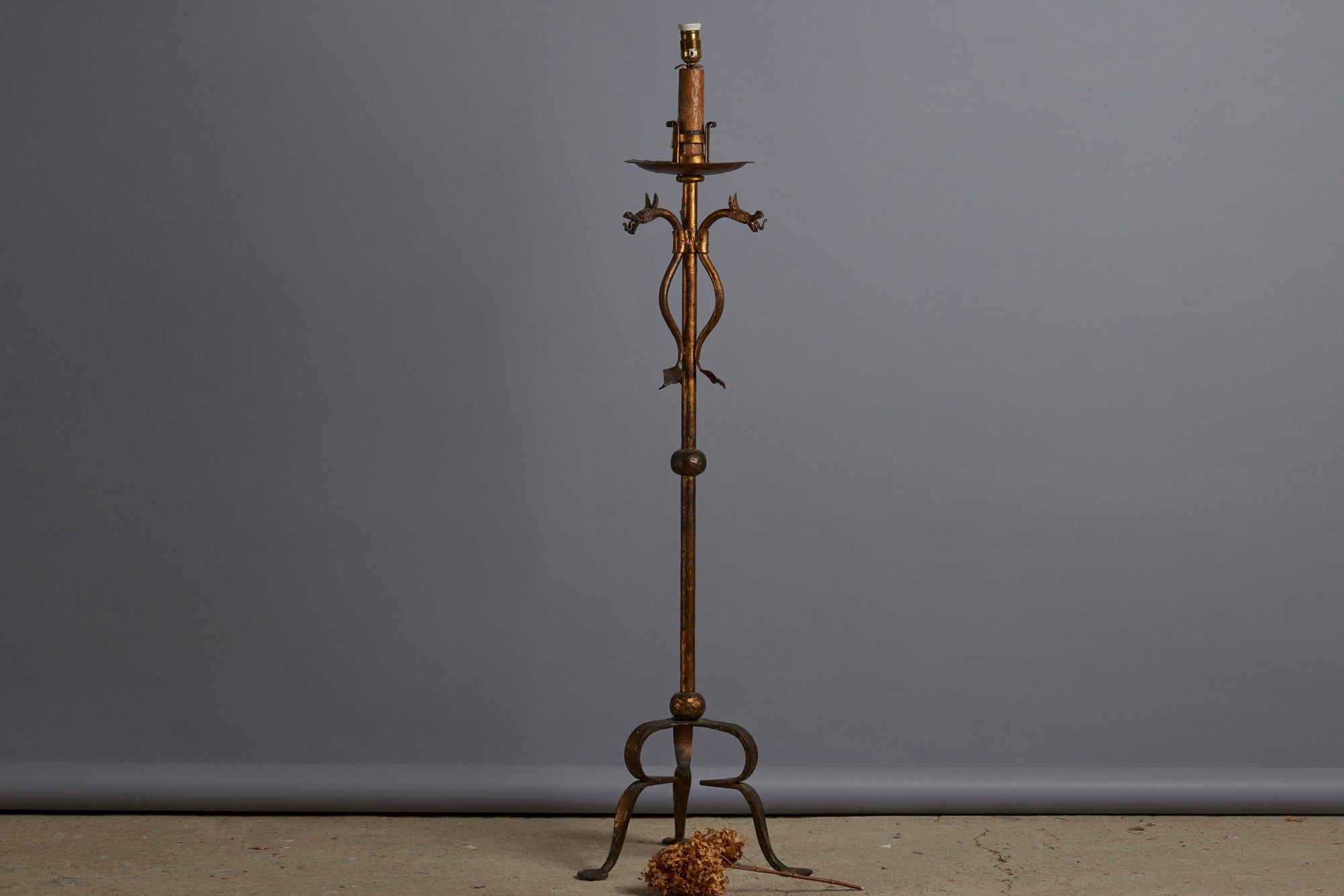 1940s Wrought Iron Gilt Neo Gothic Floor Lamp with Dragons on a Tall Torshier Base