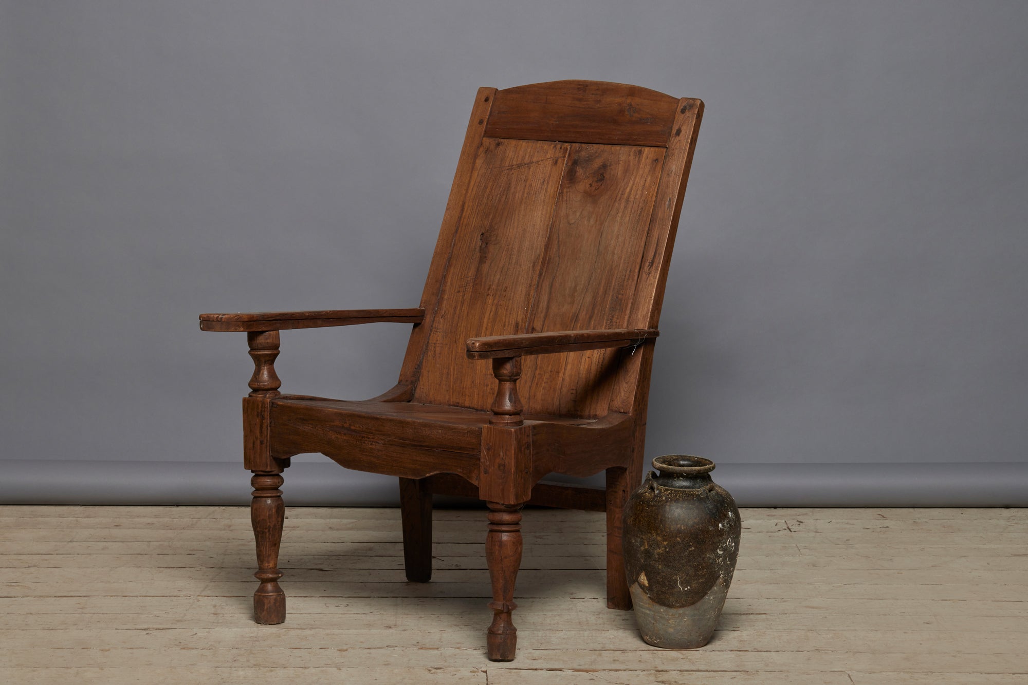 19th Century Dtuch Colonial Teak Lounge Chair with a Solid Back & Seat