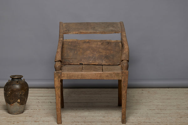 Sculptural Primitive Teak Relaxing Chair from the Island of Sumatra with an Extended Back