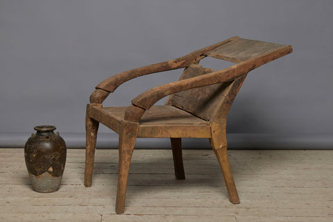 Sculptural Primitive Teak Relaxing Chair from the Island of Sumatra with an Extended Back