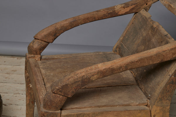 Sculptural Primitive Teak Relaxing Chair from the Island of Sumatra with an Extended Back