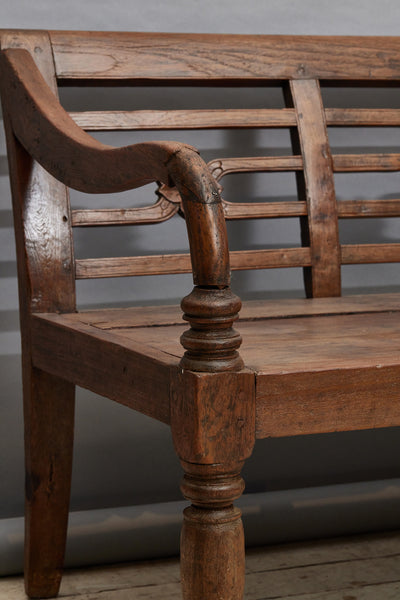 19th Century Dutch Colonial Teak Bench from Jakarta with a Carved Flower Back