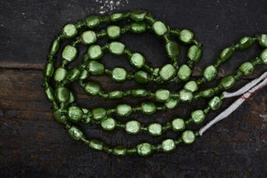 Metallic Green Glass Borneo Trade Beads